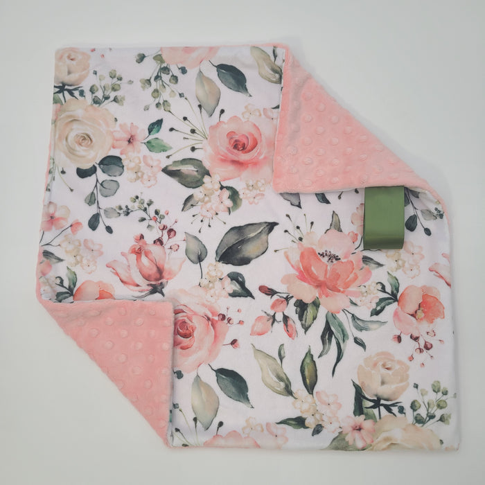 Peach floral lovey with shell dot backing
