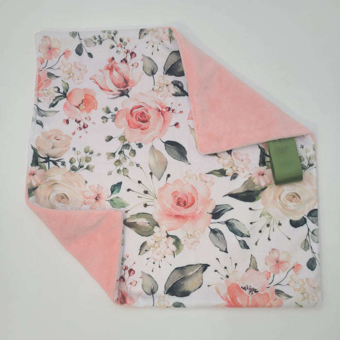 Peach floral lovey with shell smooth backing