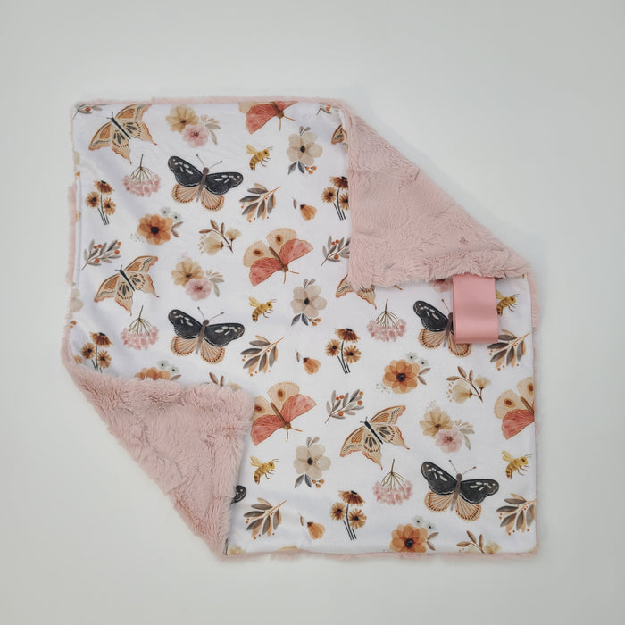 Butterfly lovey with ice pink hide backing