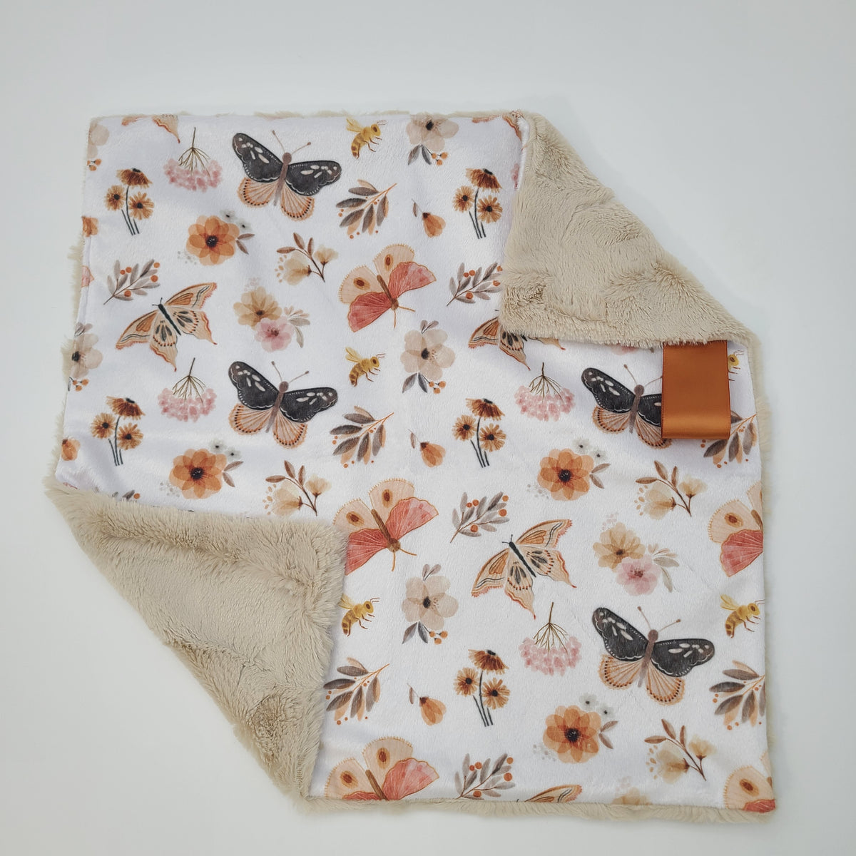 Butterfly lovey with champagne hide backing